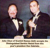 John Chun, founder of Scarlett Homes, receiving a building industry award — Hamilton, Ontario home builder since 1988