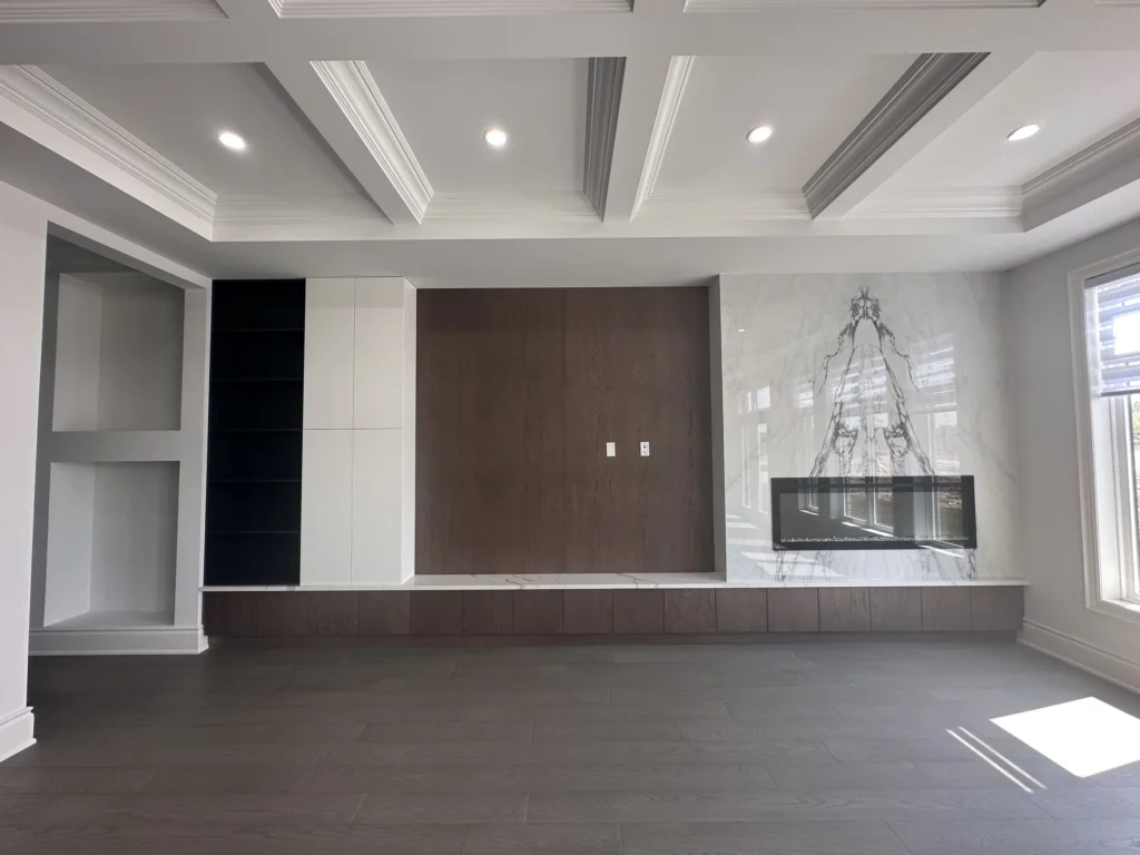 Family room wall unit with linear fireplace and engineered hardwood floor