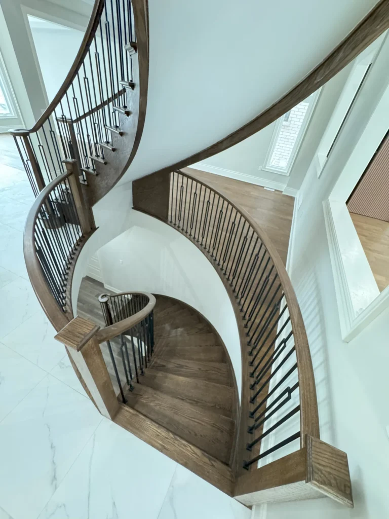 Curved staircase down to the basement, seen from above